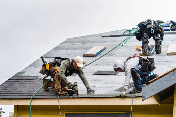 Professional Gutter Installation technician working in Covington, WA